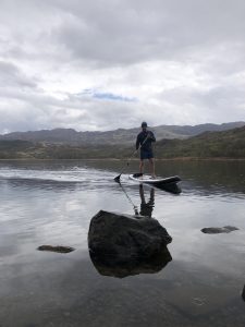 A picture of Matt, the founder of SherpaGenie on his homemade electric paddleboard.